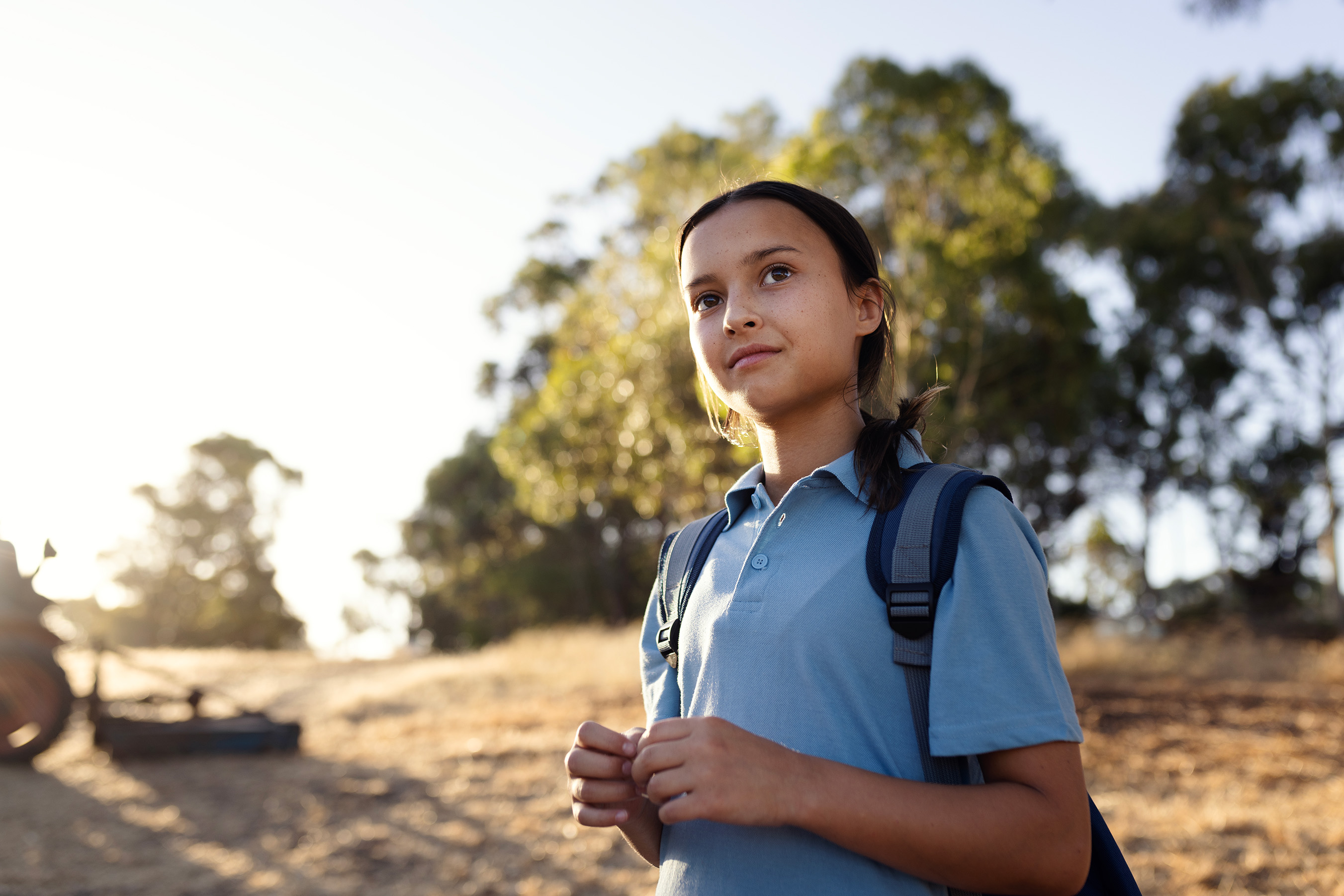 child looking off into the distance